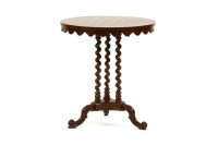 Lot 423 - A Victorian walnut games table