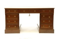 Lot 456 - A 20th Century mahogany pedestal desk