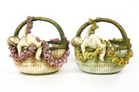 Lot 207 - A pair of Austrian porcelain basket form cache pots
