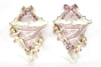 Lot 179 - A pair of Continental porcelain wall pockets