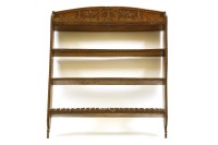 Lot 555 - A late 19th Century oak carved hanging plate rack