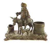 Lot 471 - A bronze desk stand