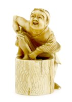 Lot 311 - A Japanese ivory okimono