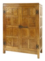 Lot 140 - A Robert ‘Mouseman’ Thompson oak wardrobe