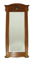 Lot 50 - An oak ‘Fine Feathers’ pier mirror