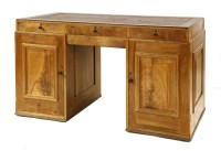Lot 149 - A walnut pedestal desk