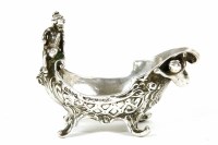 Lot 314 - An Edwardian silver miniature cream jug