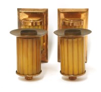 Lot 263 - A pair of Art Deco phenolic and copper-mounted wall lights
