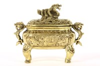 Lot 438 - A Chinese brass incense burner of rectangular form on four mask and claw legs