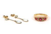 Lot 116 - A pair of gold aquamarine spectacle set drop earrings