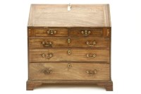 Lot 427 - A George III mahogany bureau