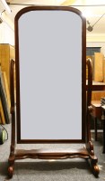 Lot 338 - A Victorian style mahogany cheval mirror on scrolling supports
