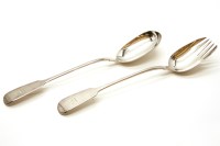 Lot 318 - A pair of William IV silver fiddle pattern servers