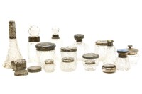 Lot 371 - A quantity of silver topped cut glass scent bottles