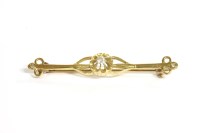 Lot 128 - A single stone diamond bar brooch