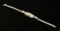 Lot 170 - An Art Deco diamond set mechanical cocktail watch