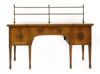 Lot 404 - A mahogany break front sideboard