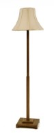 Lot 546 - An oak standard lamp