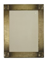 Lot 114 - An Arts and Crafts metal mirror