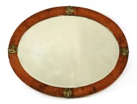 Lot 98 - An Arts and Crafts copper wall mirror