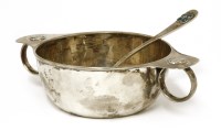 Lot 102 - A silver twin-handled porringer