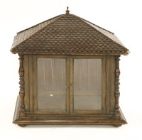 Lot 392 - A FOLK ART WALNUT AND OAK FANTASY CHEESE CUPBOARD