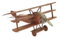 Lot 128 - A PAINTED METAL WW1 TRIPLANE MODEL
mid-20th century
