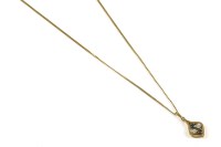 Lot 4 - A gold four stone sapphire and illusion set diamond pendant