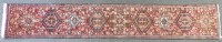 Lot 464 - A hand knotted Persian runner retailed by Liberty