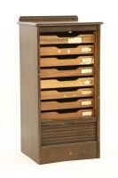 Lot 479 - A 1930s tambour fronted office cabinet