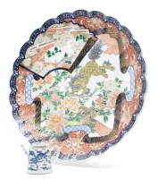 Lot 241 - A Chinese blue and white teapot and Imari charger