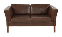 Lot 546 - A Danish brown leather two-seater settee