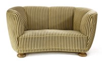 Lot 224 - A Danish banana settee
