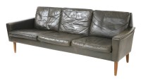 Lot 450 - A Danish black leather three-seater settee