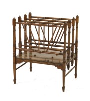 Lot 38 - A walnut four-division canterbury