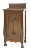 Lot 10 - A mahogany bedside cupboard