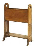 Lot 53 - An oak book rack