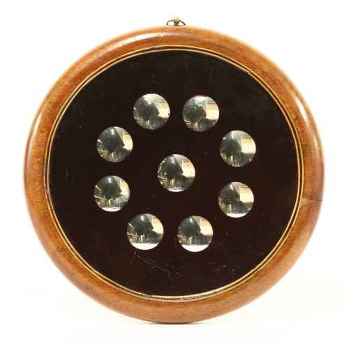 Lot 1 - A SORCERER'S MIRROR