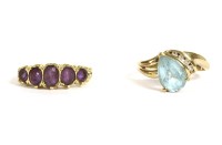 Lot 68 - An 18ct gold five stone graduated oval cut amethyst ring