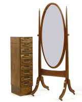 Lot 416 - A narrow 20th century oak nine drawer stationary chest