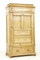 Lot 446 - A Continental pine wardrobe