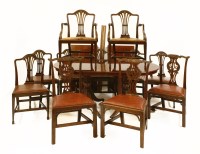 Lot 512 - A reproduction twin pillar dining table