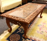 Lot 540 - A Burmese teak low table