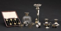 Lot 110 - A cased set of six gilt and enamel coffee spoons