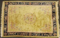 Lot 538A - A large Chinese cut pile yellow ground carpet