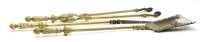 Lot 202A - Three George III style brass handled fire irons