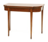 Lot 515 - A George III strung mahogany fold-over card table