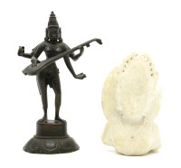 Lot 145 - An Indian white marble carved head and shoulders bust of a deity