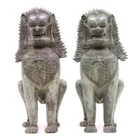 Lot 324 - A pair of Indian seated lions 

Provenance: From the estate of the late Henry Wilson