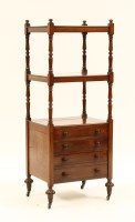 Lot 521 - A mahogany tiered whatnot
